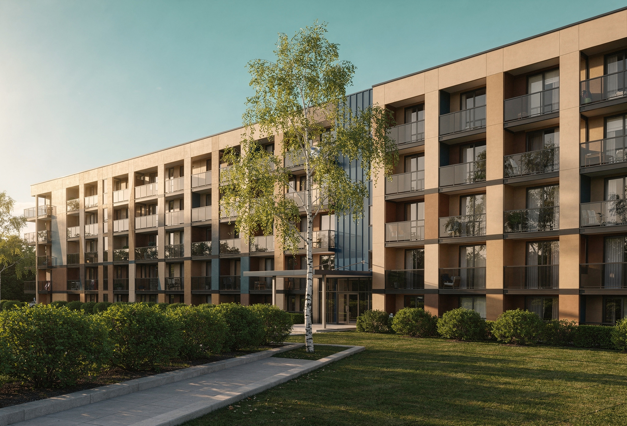 Low-rise multi-residential apartment complex with rows of recessed balconies and landscaping